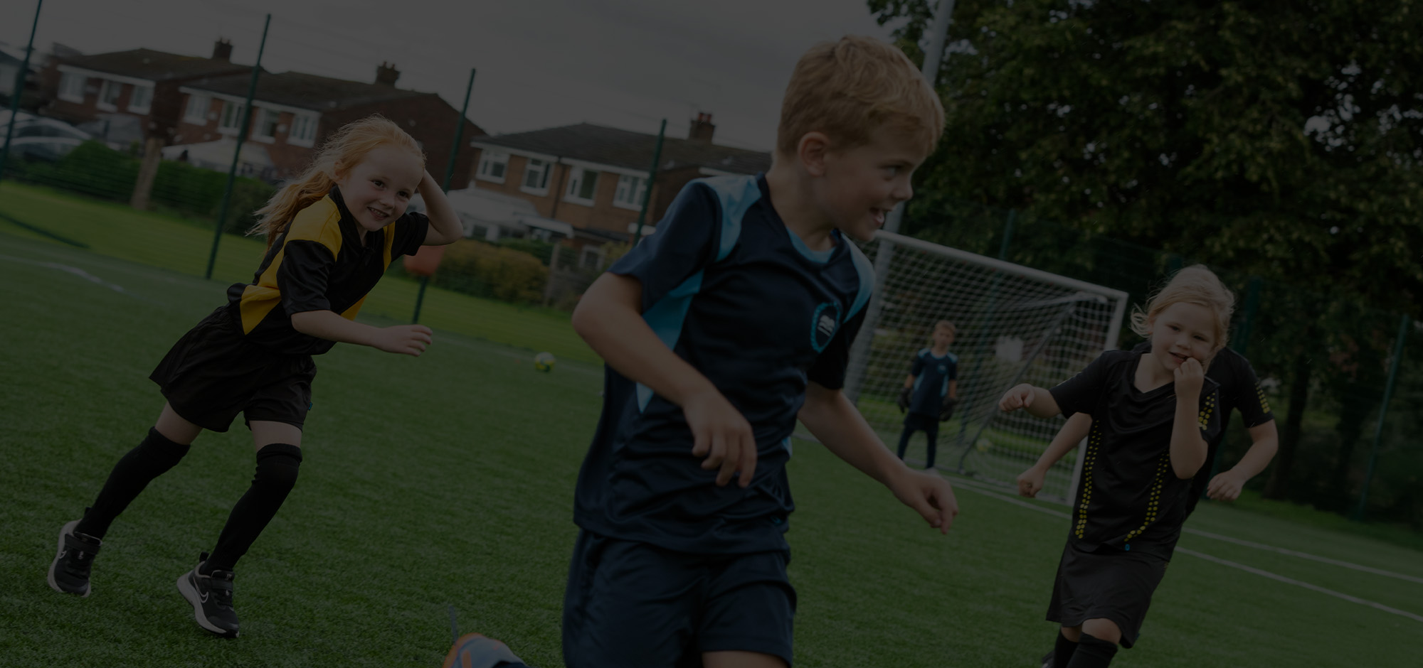 Children playing sports on a field